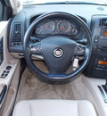 cadillac cts 2004 beige sedan gasoline 6 cylinders rear wheel drive automatic 77099