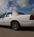 mercury grand marquis 1999 white sedan gs gasoline v8 rear wheel drive automatic 77505