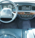 mercury grand marquis 1999 white sedan gs gasoline v8 rear wheel drive automatic 77505
