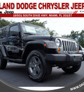 jeep wrangler 2013 black suv freedom edition gasoline 6 cylinders 4 wheel drive automatic 33157