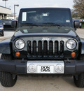 jeep wrangler 2012 black suv sahara gasoline 6 cylinders 4 wheel drive automatic 76011