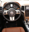 jeep grand cherokee 2012 black suv overland gasoline 8 cylinders 4 wheel drive automatic 76011