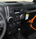 jeep wrangler unlimited 2012 orange suv sport gasoline 6 cylinders 4 wheel drive automatic 76011