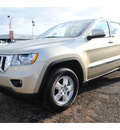 jeep grand cherokee 2011 gold suv laredo gasoline 6 cylinders 2 wheel drive automatic with overdrive 77590
