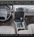 jeep grand cherokee 2002 silver suv laredo gasoline 8 cylinders rear wheel drive automatic 77008