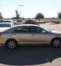 toyota camry 2011 tan sedan le gasoline 4 cylinders front wheel drive automatic 76049