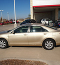 toyota camry 2011 tan sedan le gasoline 4 cylinders front wheel drive automatic 76049