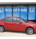 ford focus 2011 dk  red sedan sport ses gasoline 4 cylinders front wheel drive automatic 77034