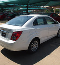 chevrolet sonic 2012 white sedan lt gasoline 4 cylinders front wheel drive automatic 76051