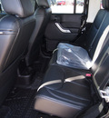 jeep wrangler unlimited 2013 black suv sahara gasoline 6 cylinders 4 wheel drive automatic 76011