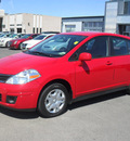 nissan versa 2010 red hatchback gasoline 4 cylinders front wheel drive automatic 79925