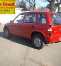 kia sportage 2001 red suv gasoline 4 cylinders dohc rear wheel drive 5 speed manual 43560