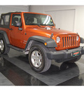 jeep wrangler 2011 orange suv sport gasoline 6 cylinders 4 wheel drive automatic with overdrive 77630