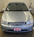 kia spectra 2005 lt  blue sedan sx gasoline 4 cylinders front wheel drive manual 44060