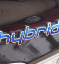 hyundai sonata hybrid 2011 black sedan hybrid hybrid 4 cylinders front wheel drive automatic 77090