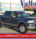 ford f 150 2004 dk  blue lariat gasoline 8 cylinders 4 wheel drive automatic 78130
