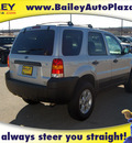 ford escape 2006 gray suv gasoline 6 cylinders front wheel drive 4 speed automatic 76450
