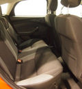 ford focus 2012 orange hatchback se flex fuel 4 cylinders front wheel drive automatic 75219