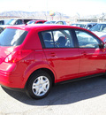nissan versa 2011 red hatchback gasoline 4 cylinders front wheel drive automatic 79925