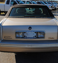 cadillac deville 1997 beige sedan gasoline v8 front wheel drive automatic 44024