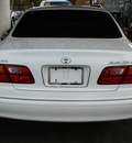 toyota avalon 1999 white sedan xl gasoline 6 cylinders front wheel drive automatic 77008