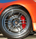 mitsubishi lancer evolution 2010 orange sedan gsr gasoline 4 cylinders all whee drive standard 75062