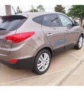 hyundai tucson 2013 brown limited gasoline 4 cylinders front wheel drive automatic 77074