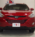 hyundai tucson 2013 dk  red gls gasoline 4 cylinders front wheel drive automatic 75150