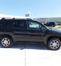 mitsubishi endeavor 2006 black suv limited gasoline 6 cylinders front wheel drive shiftable automatic 77074