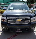 chevrolet tahoe 2013 black suv ltz flex fuel v8 4 wheel drive automatic 76051