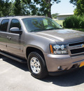 chevrolet suburban 2013 beige suv lt 1500 flex fuel v8 2 wheel drive automatic with overdrive 77864