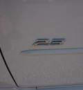 mazda mazda3 2009 white hatchback gasoline 4 cylinders front wheel drive standard 77539