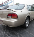 nissan maxima 1997 tan sedan gxe gasoline v6 front wheel drive automatic with overdrive 45840
