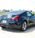 nissan 370z 2009 black coupe gasoline 6 cylinders rear wheel drive 6 speed manual 76011