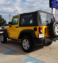 jeep wrangler 2011 yellow suv sport gasoline 6 cylinders 4 wheel drive 6 speed manual 76210