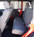 jeep wrangler unlimited 2009 orange suv rubicon gasoline 6 cylinders 4 wheel drive automatic 79110