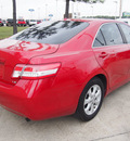 toyota camry 2010 red sedan le gasoline 4 cylinders front wheel drive automatic with overdrive 77539