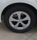 toyota prius 2014 white hatchback three hybrid 4 cylinders front wheel drive cvt 76053