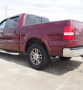 ford f 150 2005 red lariat 8 cylinders automatic 77505