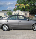toyota camry 2004 gray sedan xle gasoline 4 cylinders front wheel drive automatic 77379