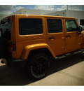 jeep wrangler unlimited 2014 brown suv altitude edition 6 cylinders automatic 77375