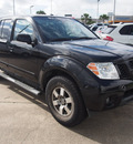 nissan frontier 2010 black pro 4x gasoline 6 cylinders 2 wheel drive automatic with overdrive 77539