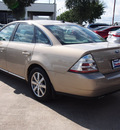 ford taurus 2008 lt  brown sedan sel gasoline 6 cylinders front wheel drive automatic 77065