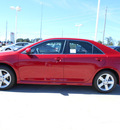 toyota camry 2014 red sedan se gasoline 4 cylinders front wheel drive 6 speed automatic 75569